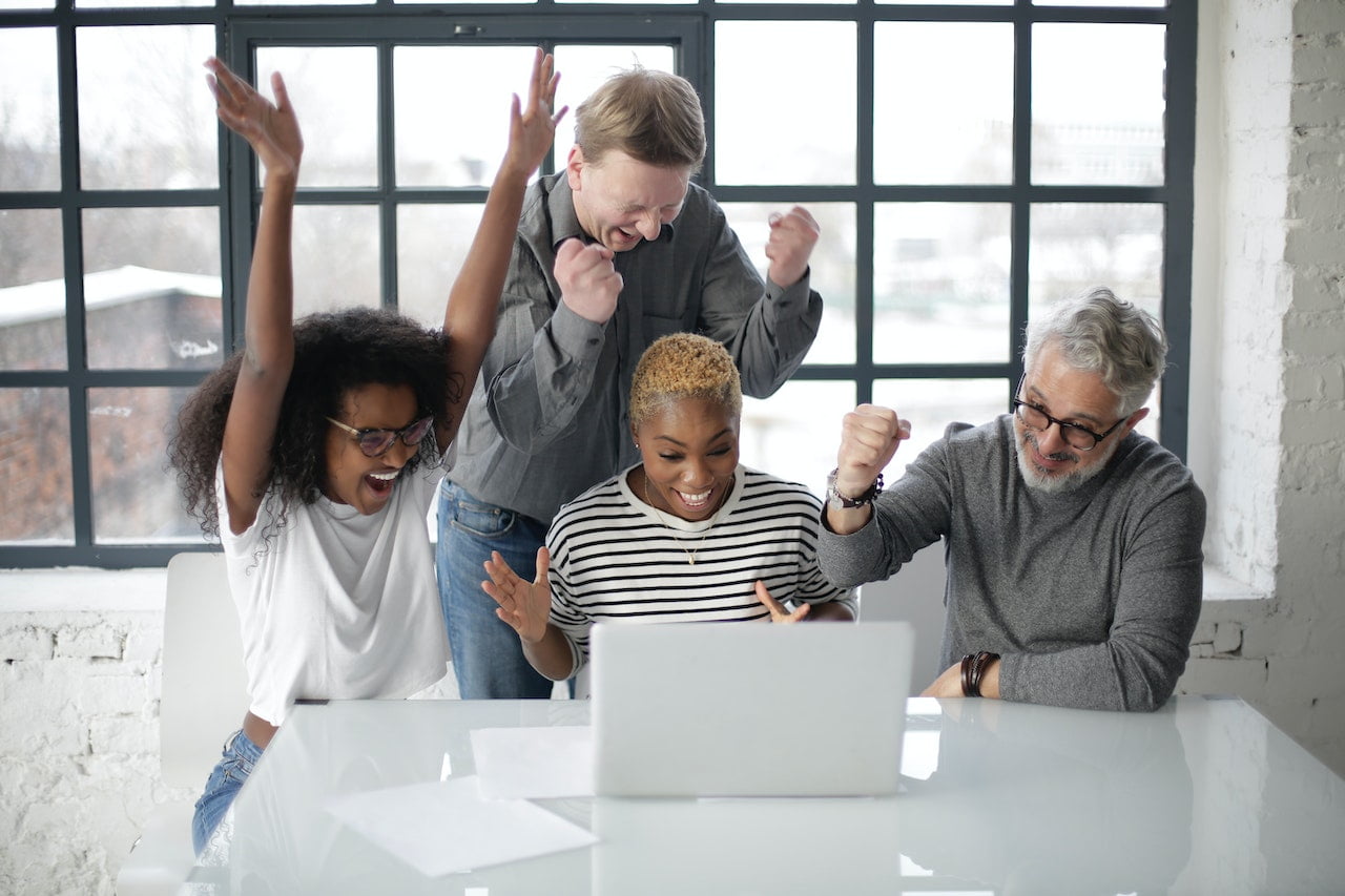 a winning happy loyal office team