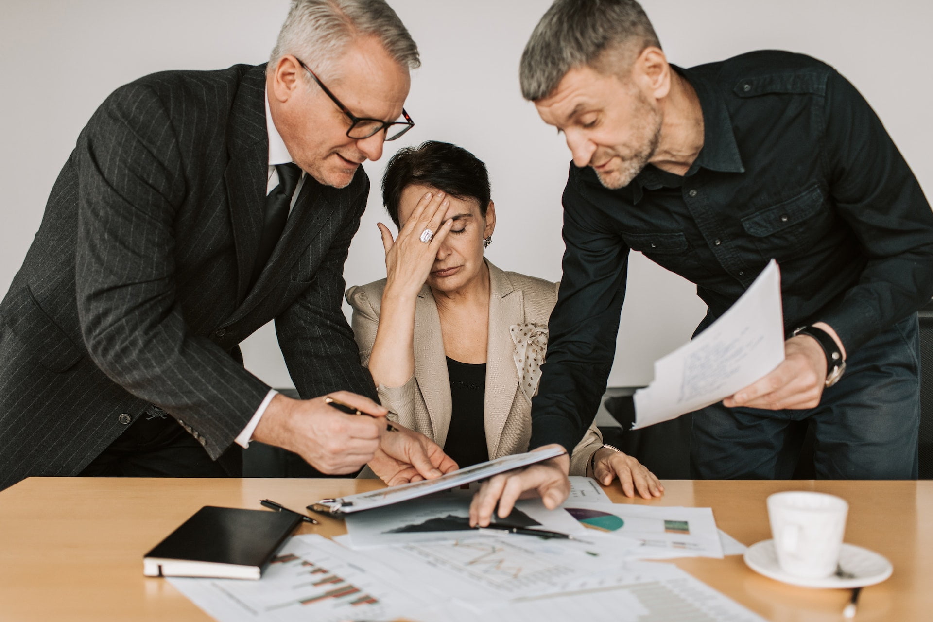 a person overwhelmed by their work responsibilities